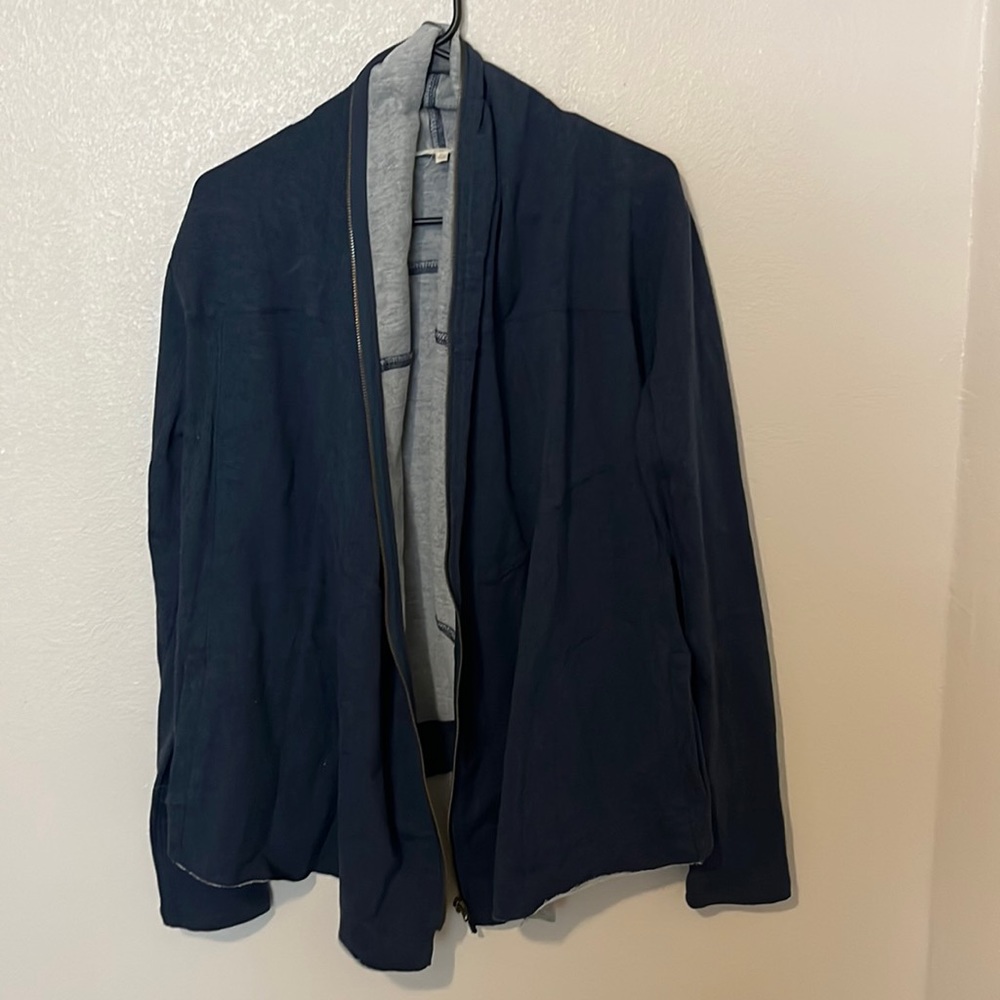 Dark blue cardigan with zipper detail. Size medium.